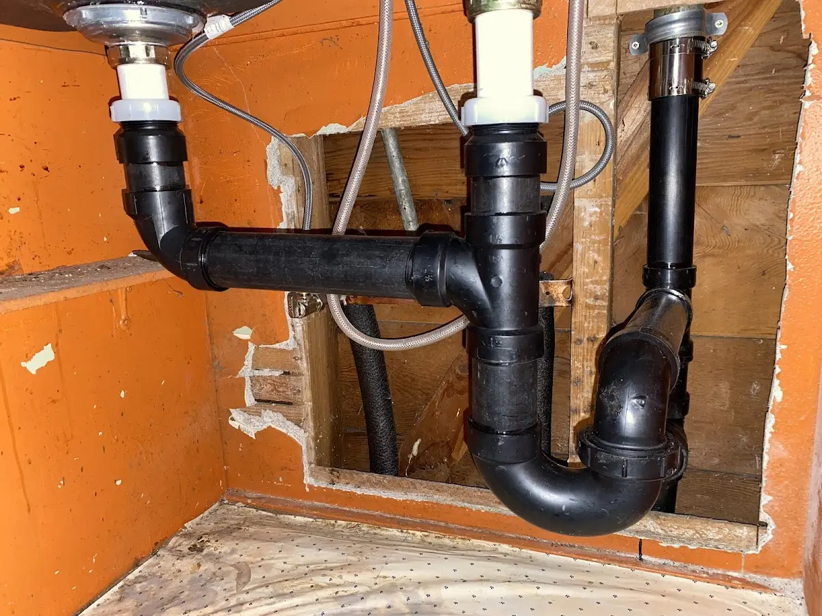 Professional Garbage Disposal Repair equipment and tools on the job in West Hattiesburg